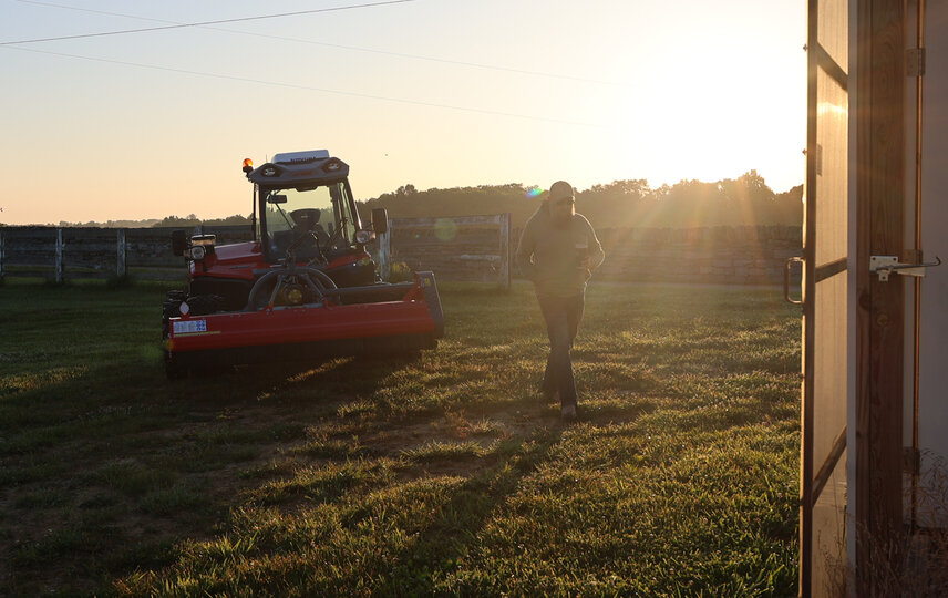 Johnny Philippo finishes a full day after tackling the steep, rugged slopes of his family farm in Kentucky.
