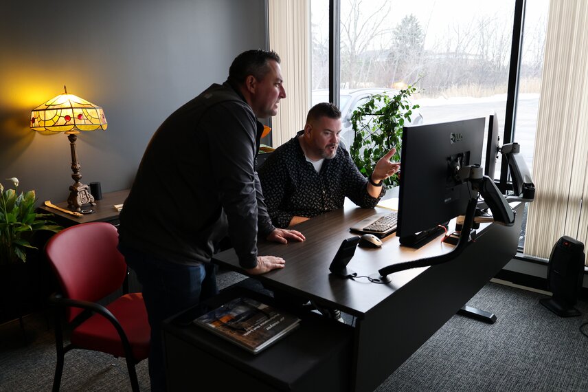 Jason Bartuseck, General Manager and Nate Kallay, Director of Sales, discuss the  weekly schedule.
