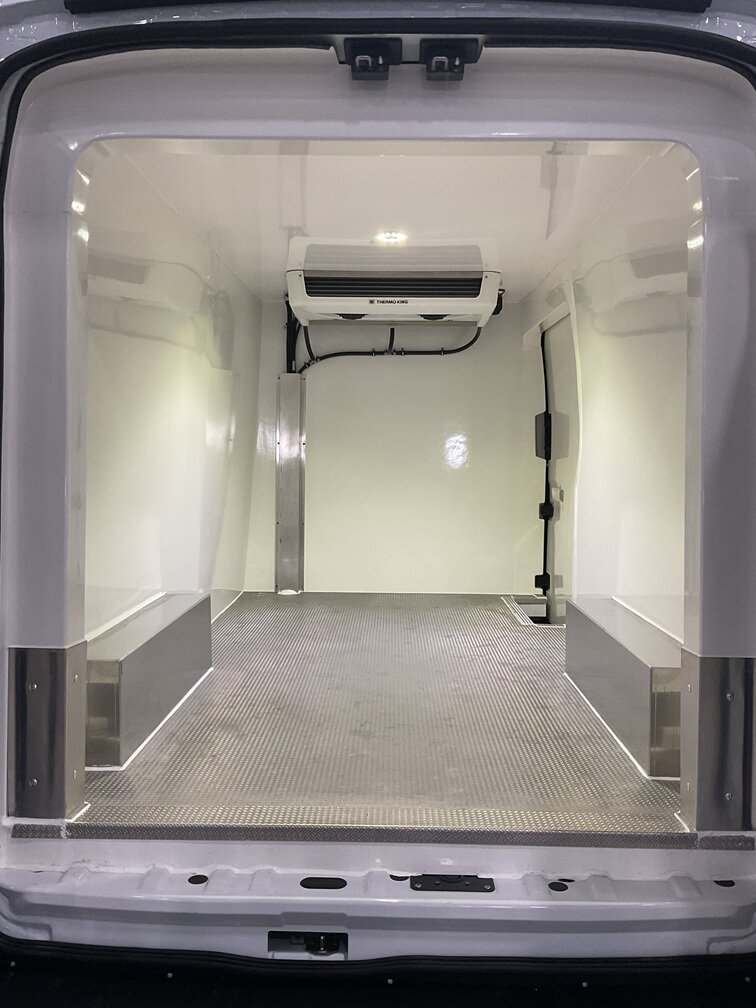 The interior provides ample cargo space while maintaining the temperature needed for refrigerated products.